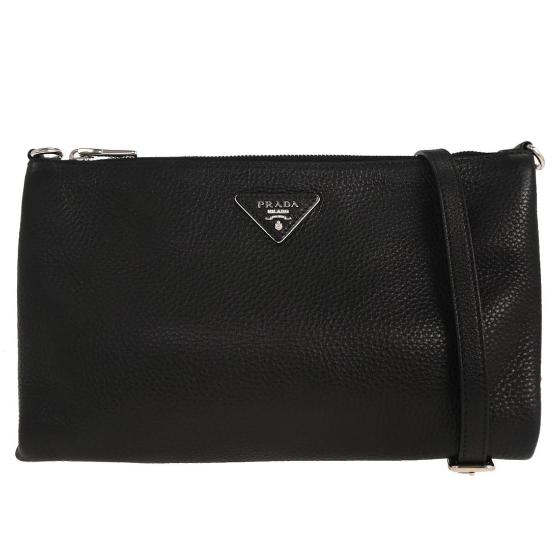 Prada Vitello Daino Leather Crossbody Flat Zip Bag: Prada Vitello Daino Leather Crossbody Flat Zip Bag This Prada Flat Zip Crossbody Bag is crafted from black leather, designed for women. It features a flat zip closure and offers a sleek, compact silho