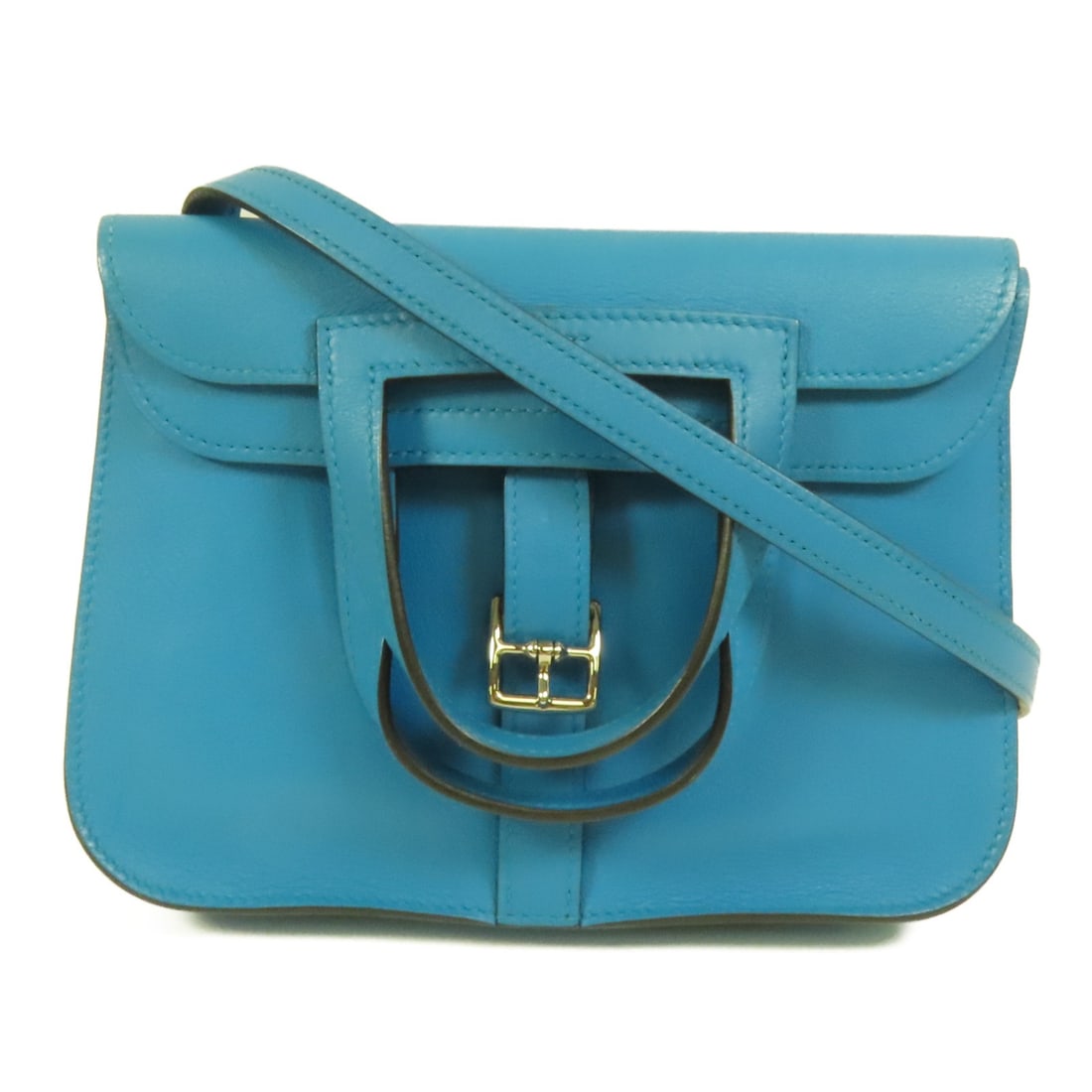 Mini Halzan 2way Shoulder Bag in Bleu Zanzibar Swift Leather with Palladium Hardware: Mini Halzan 2way Shoulder Bag in Bleu Zanzibar Swift Leather with Palladium Hardware This HERMES Mini Halzan 2way shoulder bag features blue calfskin leather in the elegant Bleu Zanzibar shade. Design