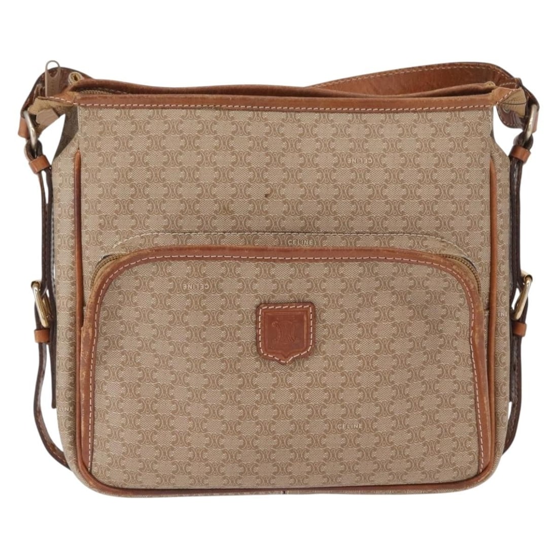 Vintage Macadam Canvas and Leather Shoulder Bag by Celine: Vintage Macadam Canvas and Leather Shoulder Bag by Celine This vintage Celine Macadam shoulder bag for women features a beige canvas body with leather accents. The bag shows signs of wear including su