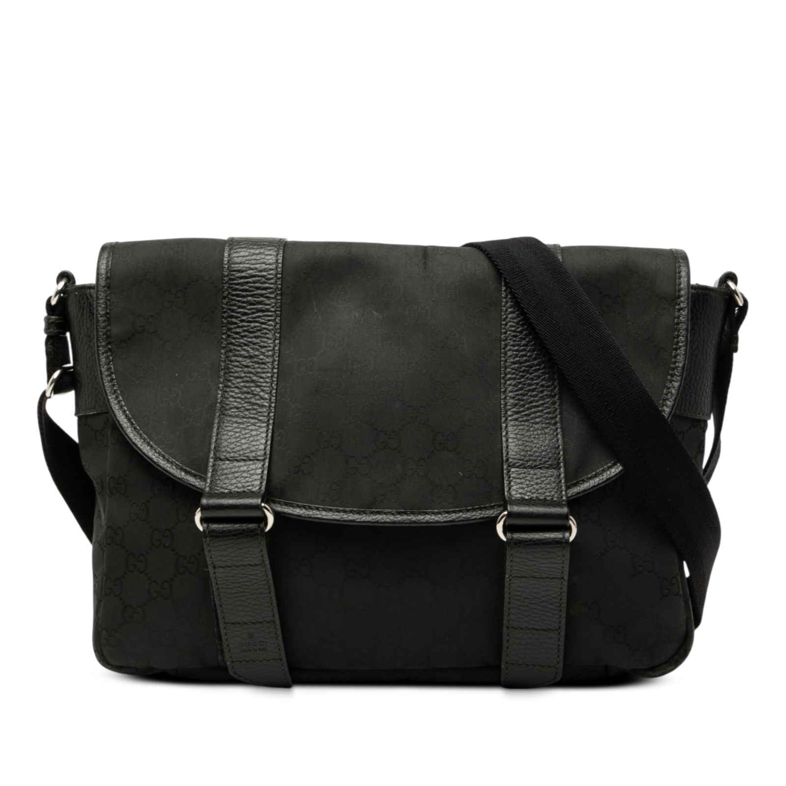 Black GG Nylon Crossbody Bag with Leather Trim by Gucci: Black GG Nylon Crossbody Bag with Leather Trim by Gucci This Gucci GG Nylon Messenger Bag features a durable nylon body with leather trim and an adjustable flat strap for comfortable wear. The front f