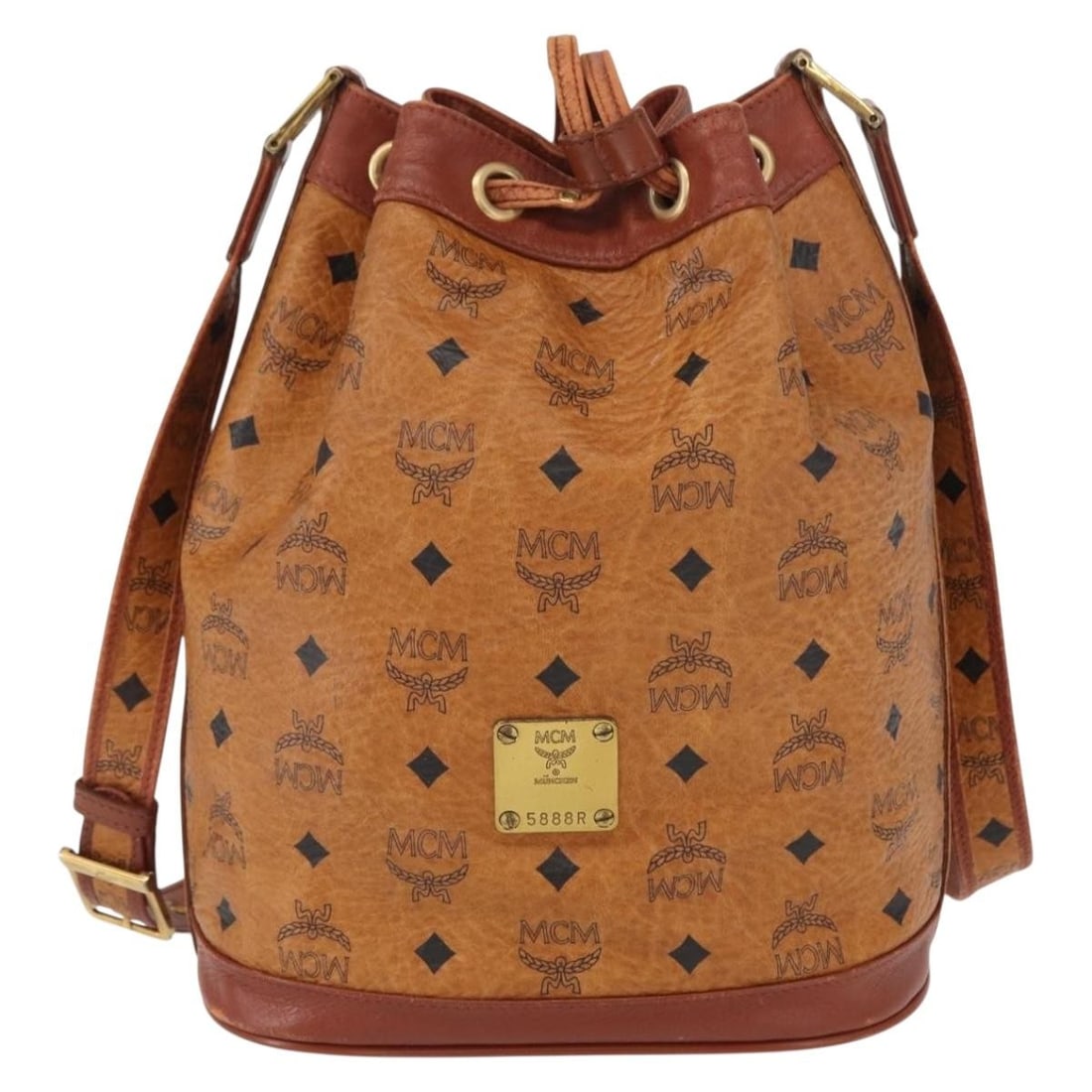Brown Canvas and Leather MCM Visetos Shoulder Bag 22cm by 29cm by 15cm: Brown Canvas and Leather MCM Visetos Shoulder Bag 22cm by 29cm by 15cm MCM Visetos shoulder bag for women in brown canvas with leather details. The bag shows signs of use including rubbing, stains, an