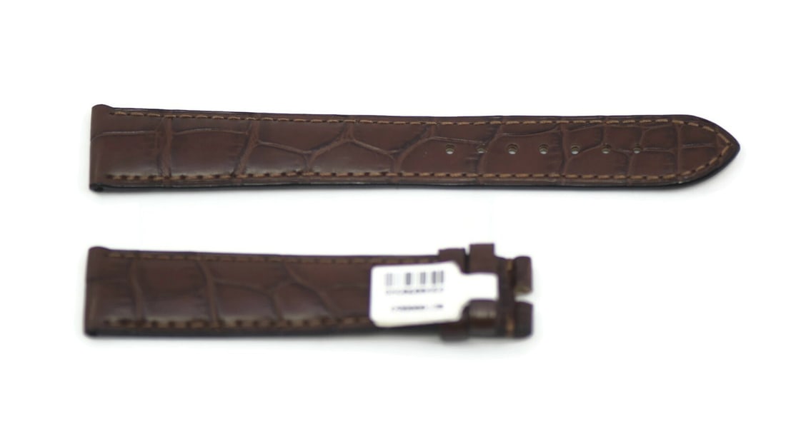 Authentic Omega Brown Leather Wristwatch Strap 18mm: Authentic Omega Brown Leather Wristwatch Strap 18mm This authentic Omega brown leather strap is designed specifically for wristwatches, featuring an elegant brown color that complements a variety of w