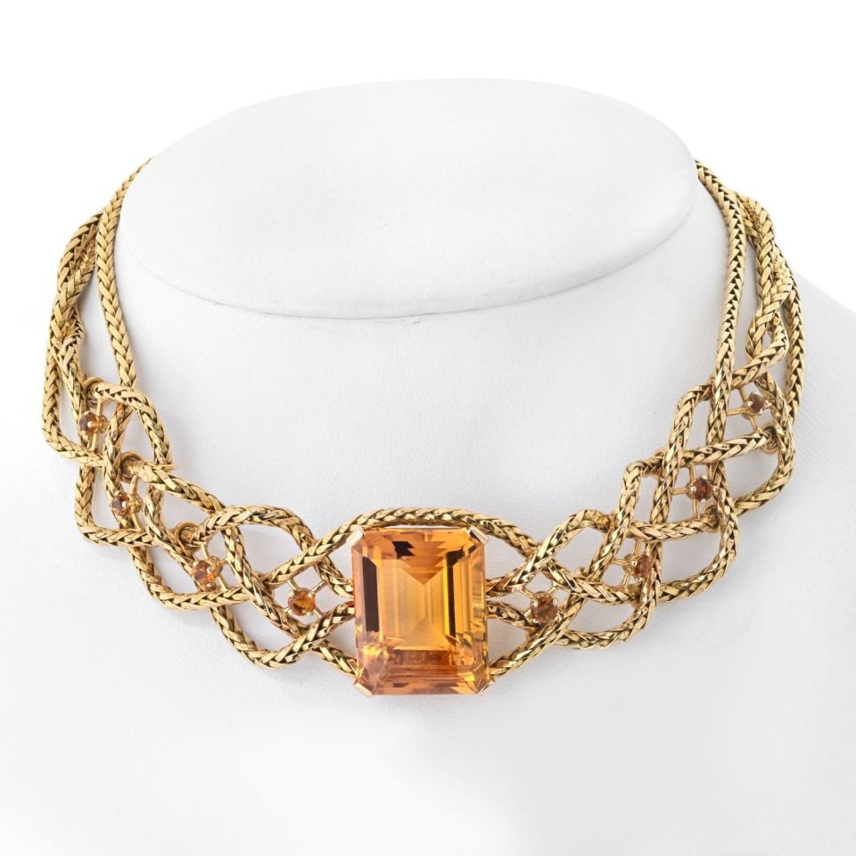 Vintage Hermes 18K Yellow Gold Braided Citrine Choker Necklace 61.50cttw: Vintage Hermes 18K Yellow Gold Braided Citrine Choker Necklace 61.50cttw This vintage Hermes choker necklace, crafted circa 1955, features an intricately braided design in 18K yellow gold and is adorn