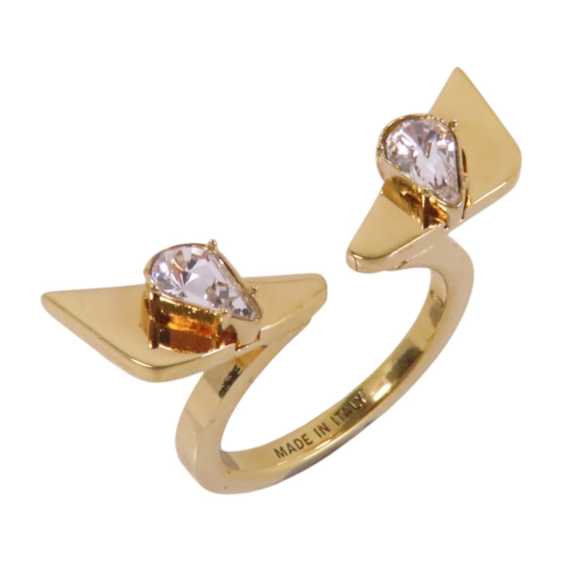 FENDI Clear Gold Tone Monster Ring Size 4.25: FENDI Clear Gold Tone Monster Ring Size 4.25 Introducing the Fendi Monster Ring, a stunning piece that showcases a unique blend of style and craftsmanship. This ring features a clear frame and gold to