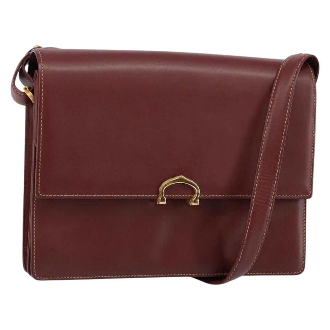 CARTIER Bordeaux Leather Shoulder Bag with Gold Accents: CARTIER Bordeaux Leather Shoulder Bag with Gold Accents This exquisite CARTIER shoulder bag is crafted from luxurious leather in a striking bordeaux and gold color combination. Designed for both style