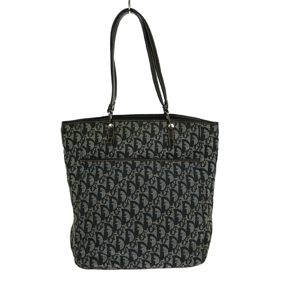 Christian Dior Trotter Medium Navy Canvas Leather Tote Bag BM-0012: Christian Dior Trotter Medium Navy Canvas Leather Tote Bag BM-0012 This Christian Dior Trotter tote bag features a navy canvas and leather exterior with double handles and a zip closure. The medium-si