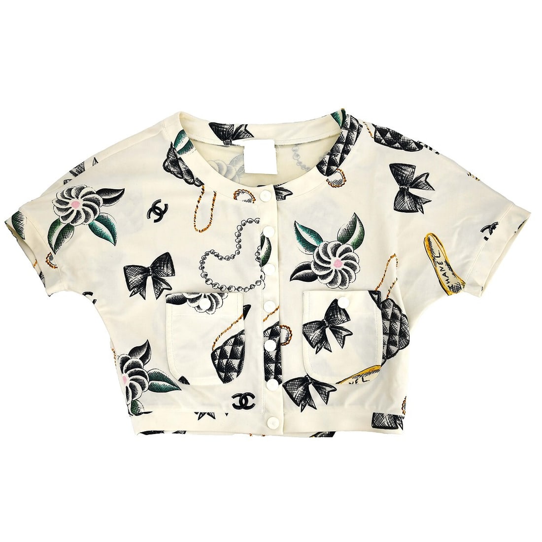 Chanel Ivory Cropped T-shirt Size 38 Short Sleeve Round Neck: Chanel Ivory Cropped T-shirt Size 38 Short Sleeve Round Neck Elevate your casual wardrobe with this chic Chanel Cropped T-shirt in a timeless ivory hue. Designed for a regular fit, this stylish top fe