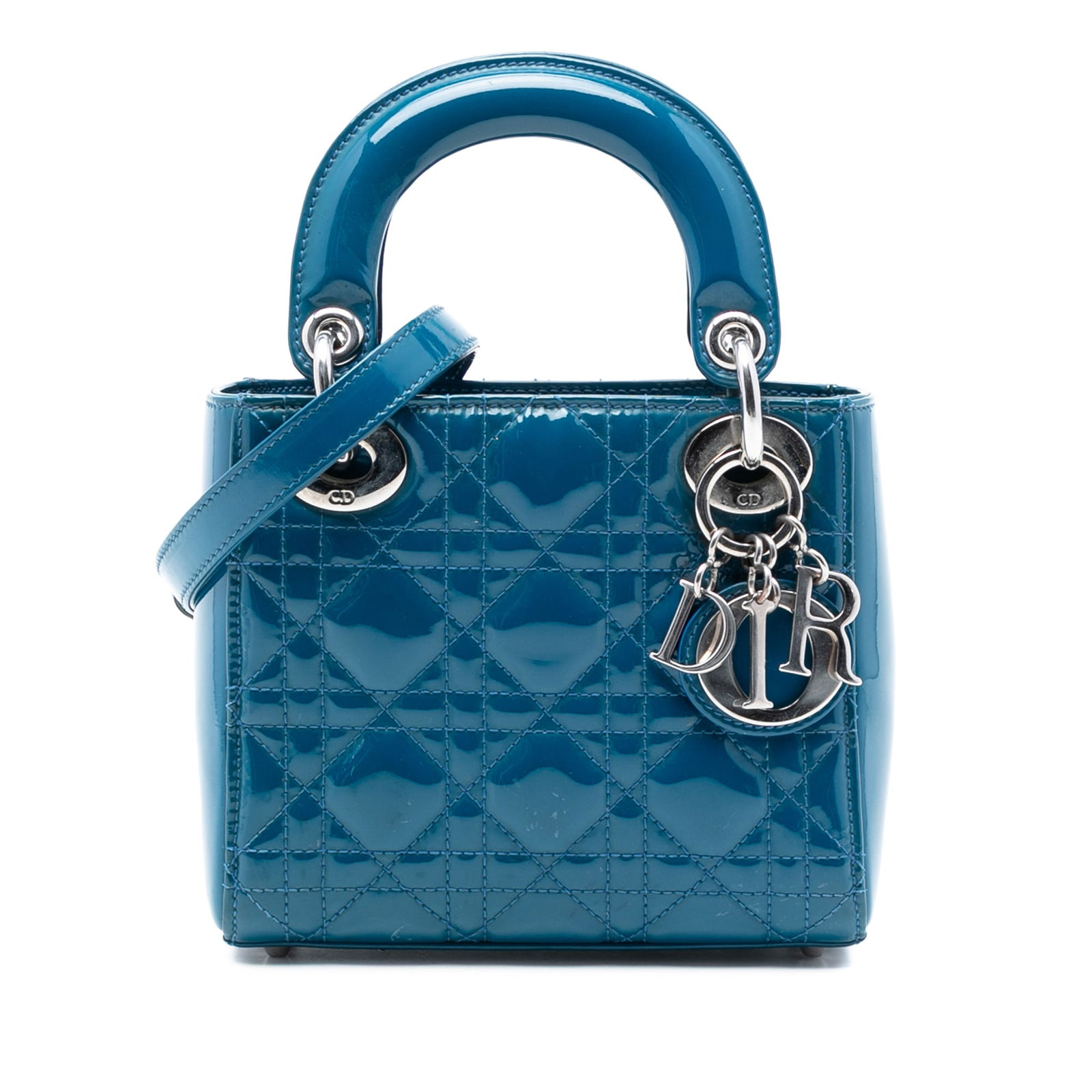Dior Lady Dior Mini Blue Patent Cannage Leather Bag with Detachable Strap: Dior Lady Dior Mini Blue Patent Cannage Leather Bag with Detachable Strap This Mini Patent Cannage Lady Dior bag features a quilted patent leather body in blue, flat top handles, a detachable flat lea