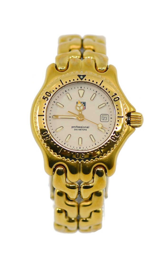 TAG Heuer Professional WG1330 Two Tone Stainless Steel Watch with Box and Papers: TAG Heuer Professional WG1330 Two Tone Stainless Steel Watch with Box and Papers This TAG Heuer Professional Two Tone Stainless Steel Watch (Model: WG1330) is a sophisticated wristwatch featuring a du