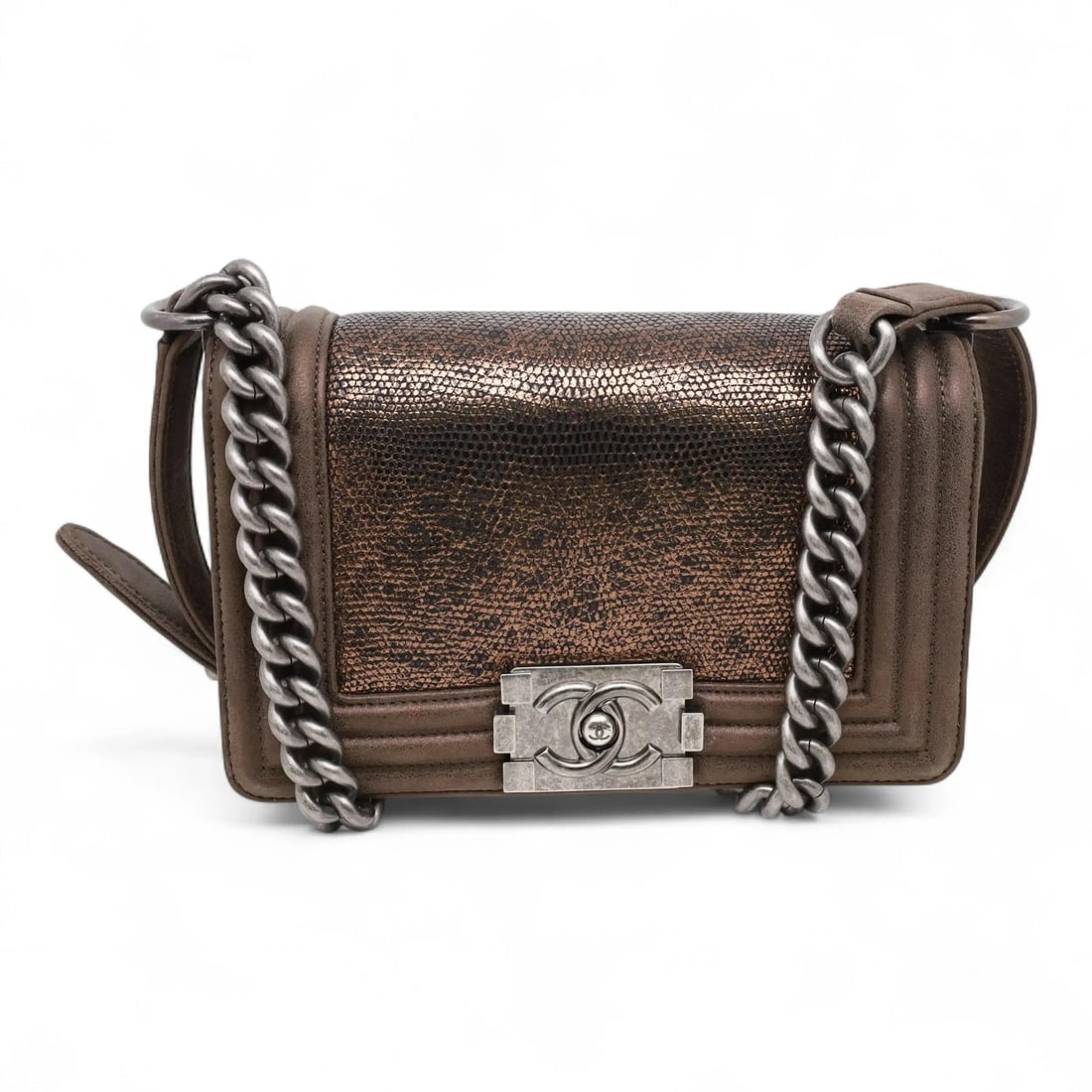 Small Chanel Boy Crossbody Bag in Metallic Quilted Brown Lizard Leather: Small Chanel Boy Crossbody Bag in Metallic Quilted Brown Lizard Leather This Chanel Small Boy Flap Crossbody Bag features metallic quilted brown leather with a lizard pattern and aged grey tone hardwa