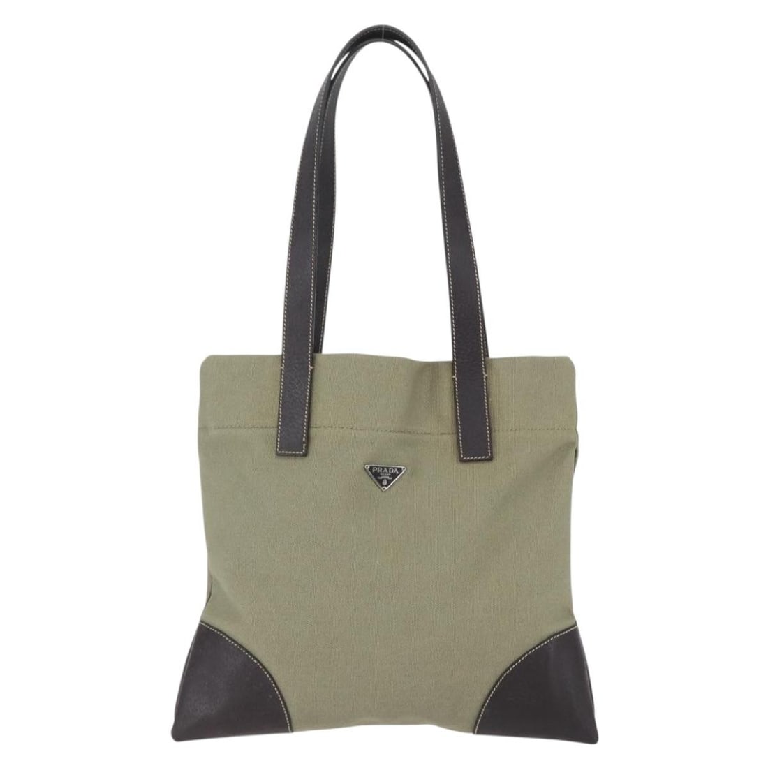 Prada Canvas Khaki Tote Bag Vintage Model 30cm by 27cm: Prada Canvas Khaki Tote Bag Vintage Model 30cm by 27cm This Prada vintage tote bag for women features a khaki canvas exterior. It is a pre-owned item with good condition showing signs of wear such as