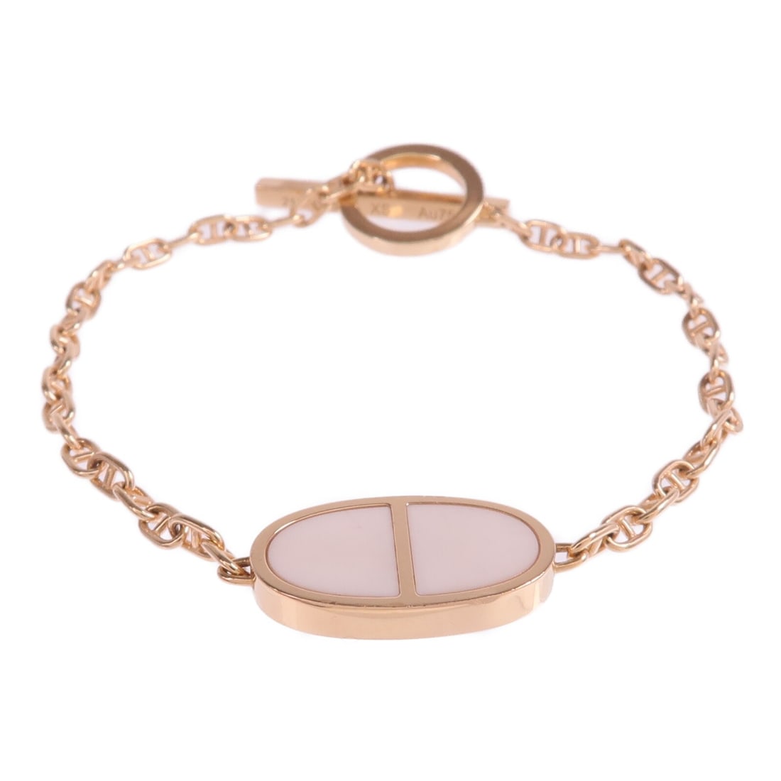 Chaine d'ancre Verso 18K Rose Gold and White Ceramic Bracelet by Hermes: Chaine d'ancre Verso 18K Rose Gold and White Ceramic Bracelet by Hermes This Hermes Chaine d'ancre Verso bracelet features 18K pink (rose) gold and white ceramic elements. The piece is crafted in Fran