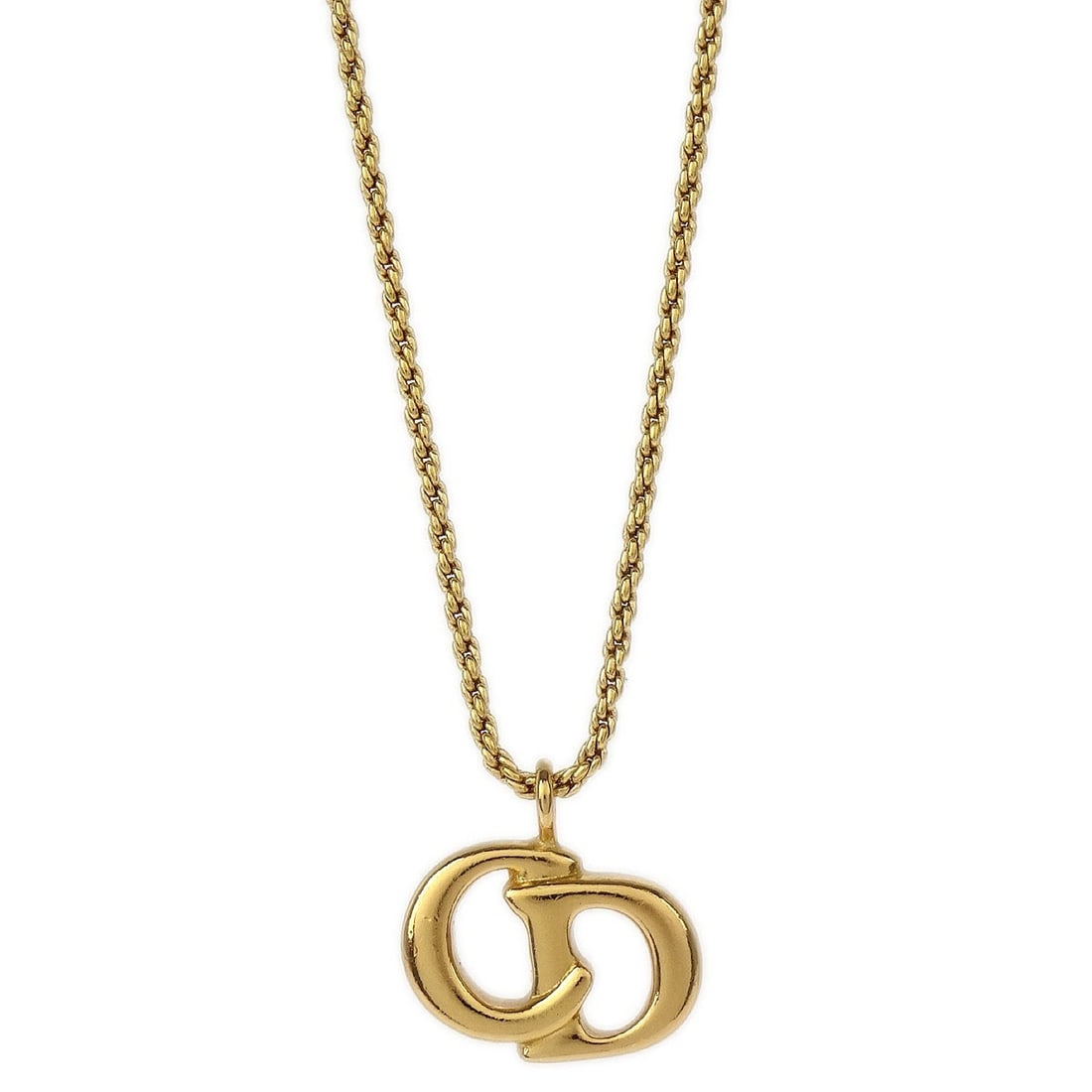 Vintage Christian Dior Gold Pendant Necklace Charm: Vintage Christian Dior Gold Pendant Necklace Charm This exquisite vintage Christian Dior necklace features a stunning gold pendant in the form of a charm. The necklace is designed to add elegance and