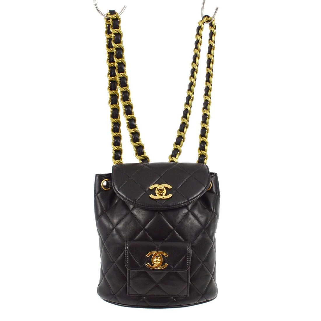 Chanel Black Lambskin Mini Duma Backpack with Chain Strap: Chanel Black Lambskin Mini Duma Backpack with Chain Strap This Chanel Black Lambskin Duma Backpack is a stylish and versatile accessory perfect for casual occasions. Crafted from luxurious lambskin, t