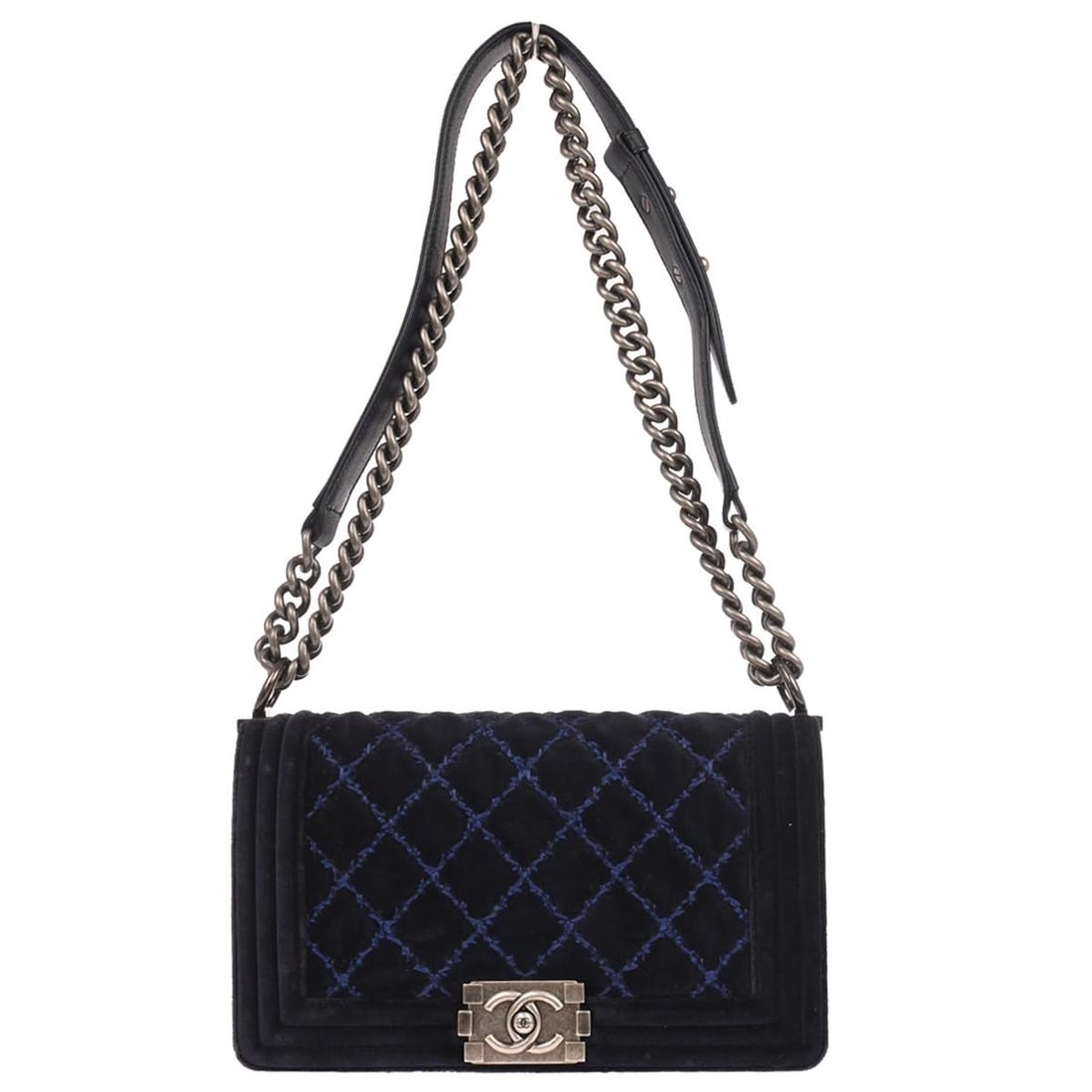 Chanel Boy Medium Navy Velvet Shoulder Bag with Chain Strap: Chanel Boy Medium Navy Velvet Shoulder Bag with Chain Strap This Chanel Boy Medium Chain Shoulder Bag features a navy velvet exterior with a square shape and quilted accents. It is equipped with a pus