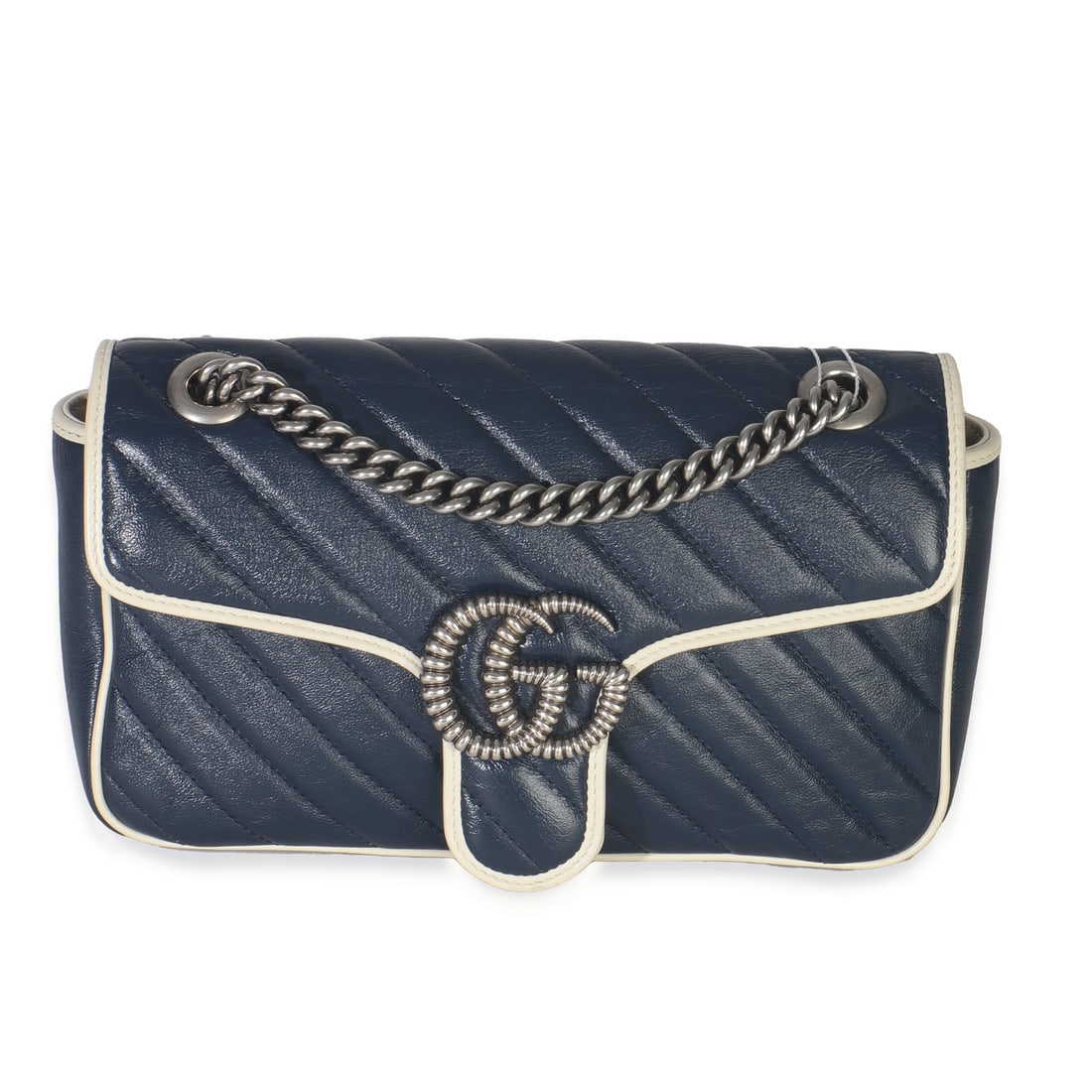 Gucci Medium GG Marmont Navy and White Leather Shoulder Bag: Gucci Medium GG Marmont Navy and White Leather Shoulder Bag This Gucci Medium GG Marmont Bag features a navy and white matelasse calfskin leather exterior with diagonal torchon detailing. The bag is s