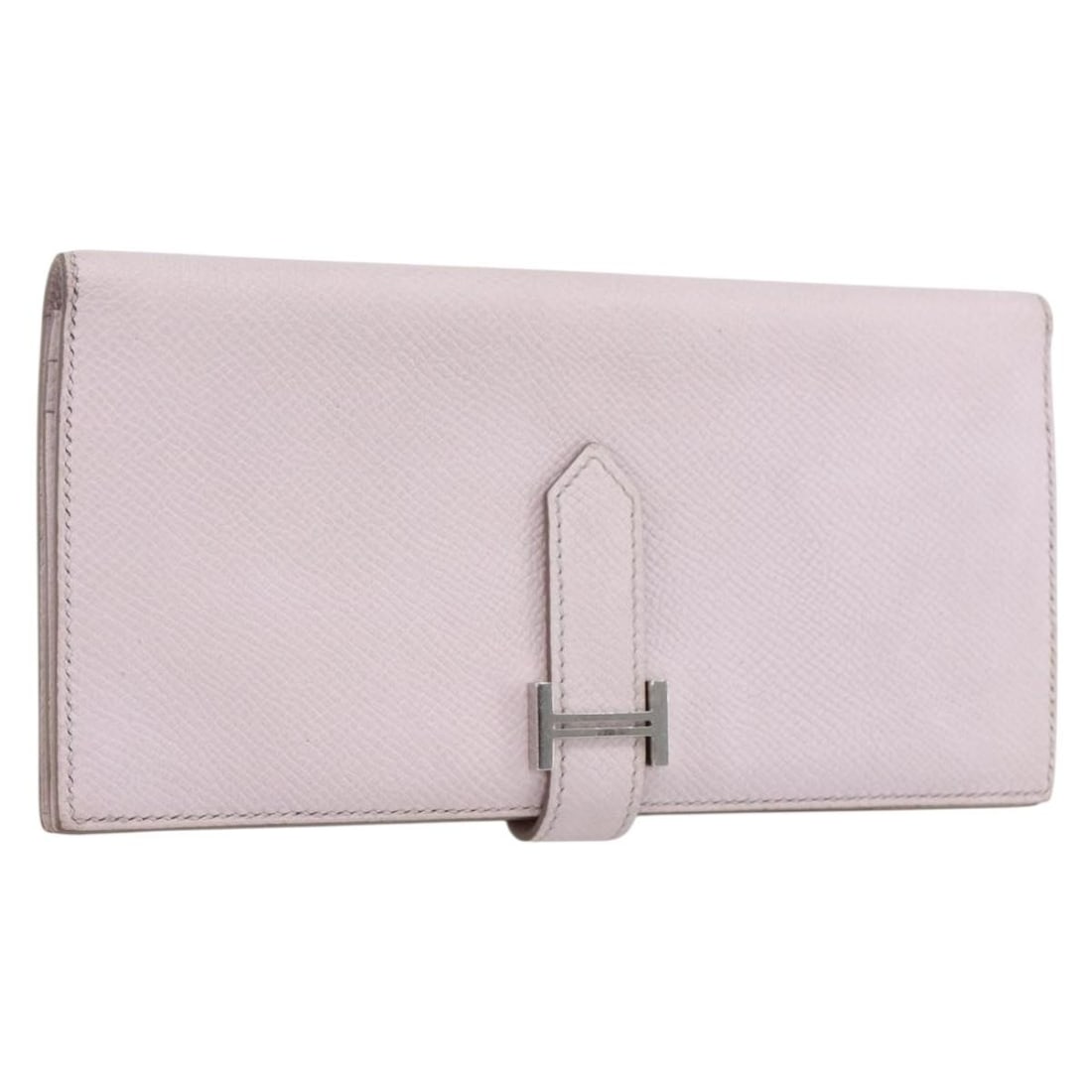 Hermes Pink Leather Long Wallet with Silver Tone Accents and Dust Bag: Hermes Pink Leather Long Wallet with Silver Tone Accents and Dust Bag This Hermes Bane Souffle long wallet features pink leather with silver-tone accents. Designed in a slim silhouette, it offers a