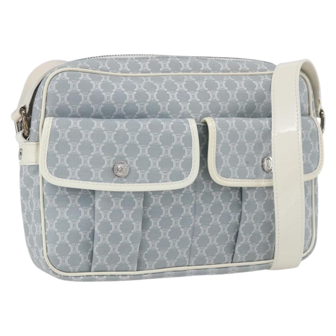 Blue Macadam Canvas Shoulder Bag by CELINE Silver Hardware: Blue Macadam Canvas Shoulder Bag by CELINE Silver Hardware This CELINE shoulder bag features the signature Macadam canvas in blue and silver. Made in Italy, it offers a compact and functional design w