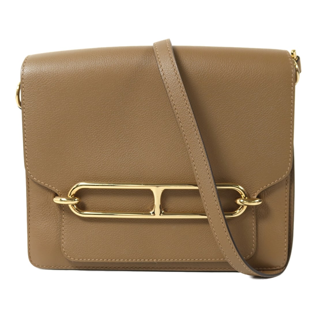 Hermes Roulis 23 Beige Evercolor Leather Shoulder Bag with Gold Hardware: Hermes Roulis 23 Beige Evercolor Leather Shoulder Bag with Gold Hardware This Hermes Roulis 23 shoulder bag is crafted from Evercolor calfskin leather in a beige Alezan shade. Featuring gold hardware,