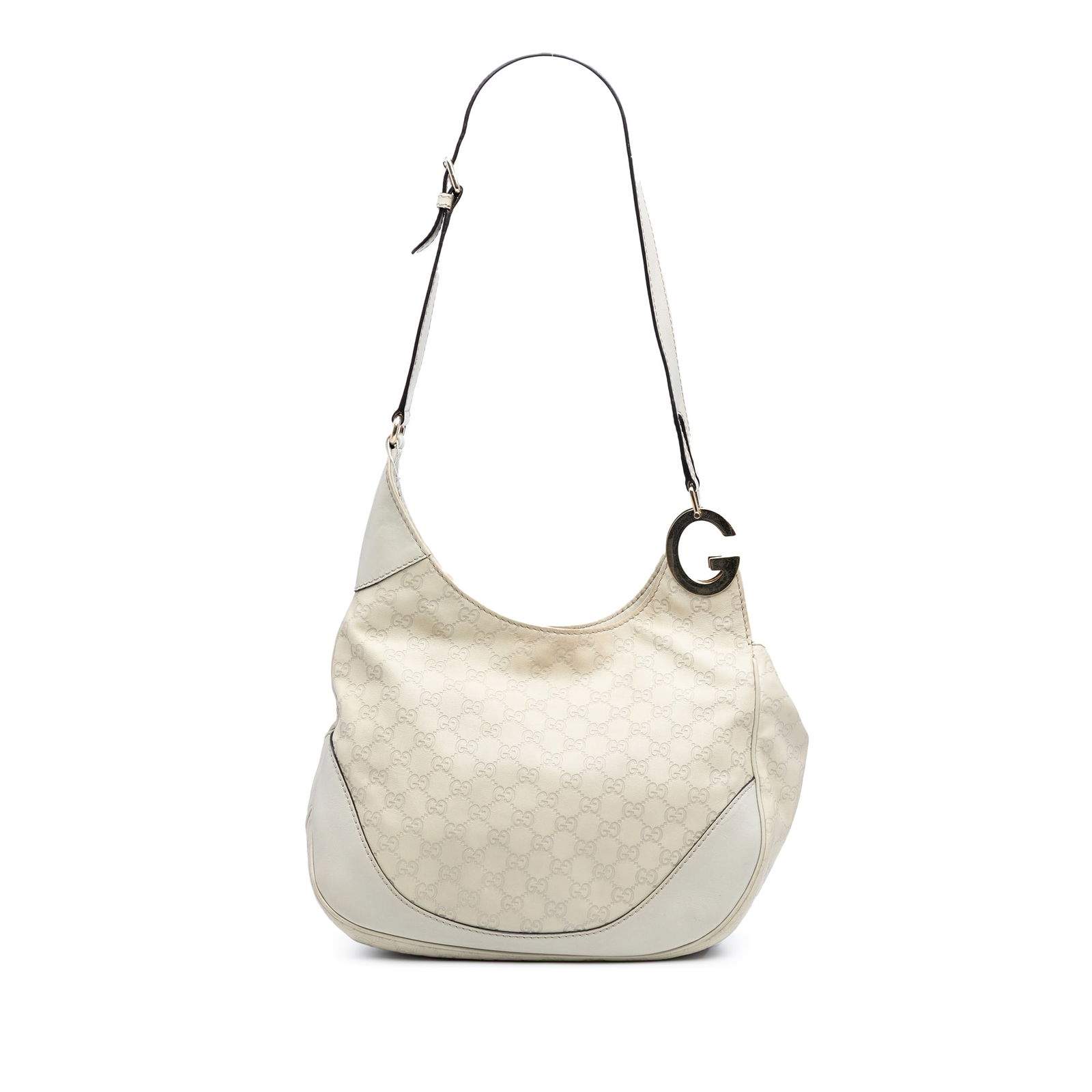Gucci Guccissima Charlotte White Leather Crossbody Bag: Gucci Guccissima Charlotte White Leather Crossbody Bag Introducing the Guccissima Charlotte Crossbody, a stylish accessory from Gucci, crafted from embossed leather. This elegant bag features an adjus