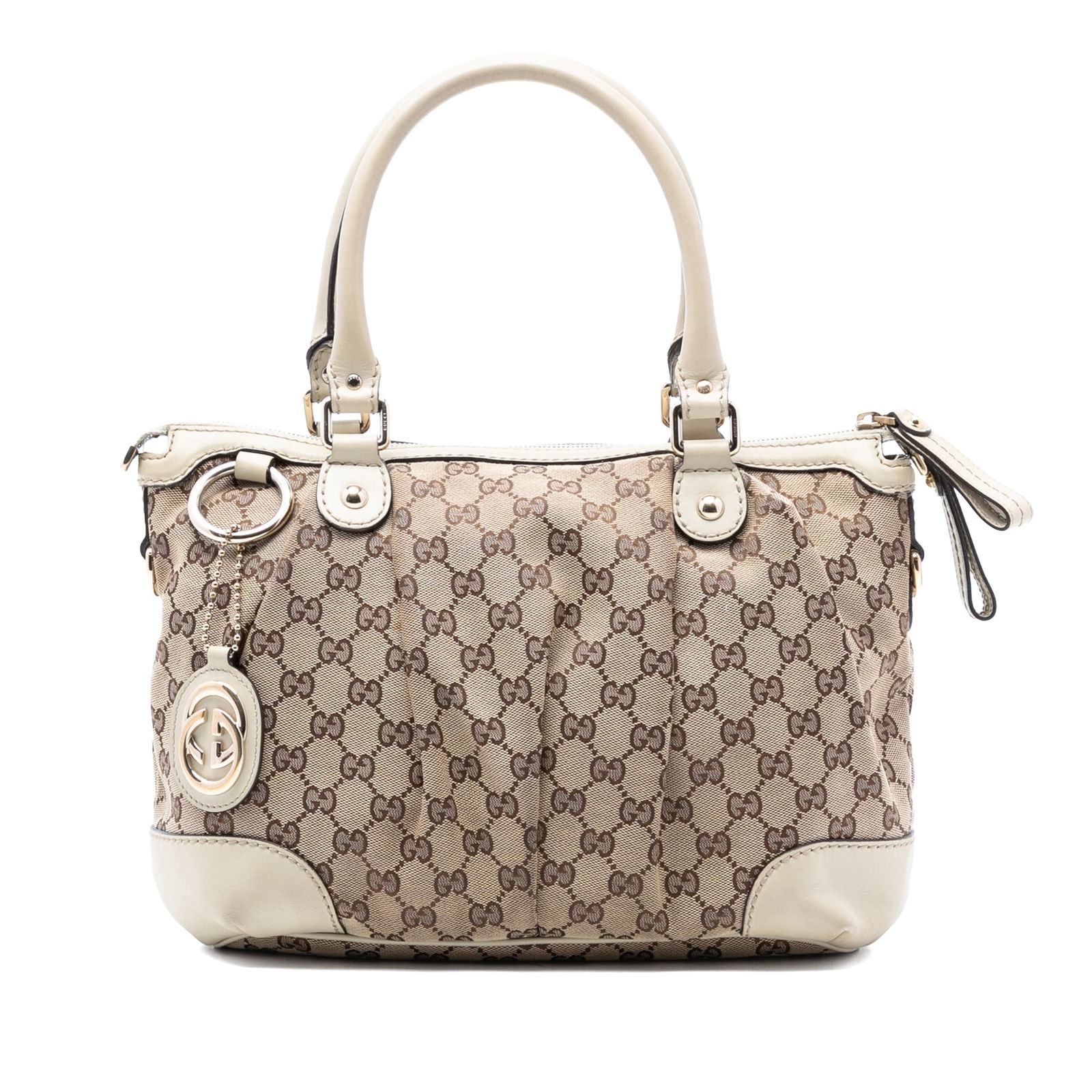 Gucci Sukey Satchel in Brown GG Canvas with Leather Accents: Gucci Sukey Satchel in Brown GG Canvas with Leather Accents The Sukey satchel features a signature GG canvas body with leather trim, rolled leather handles, a flat leather strap, a top zip closure, an