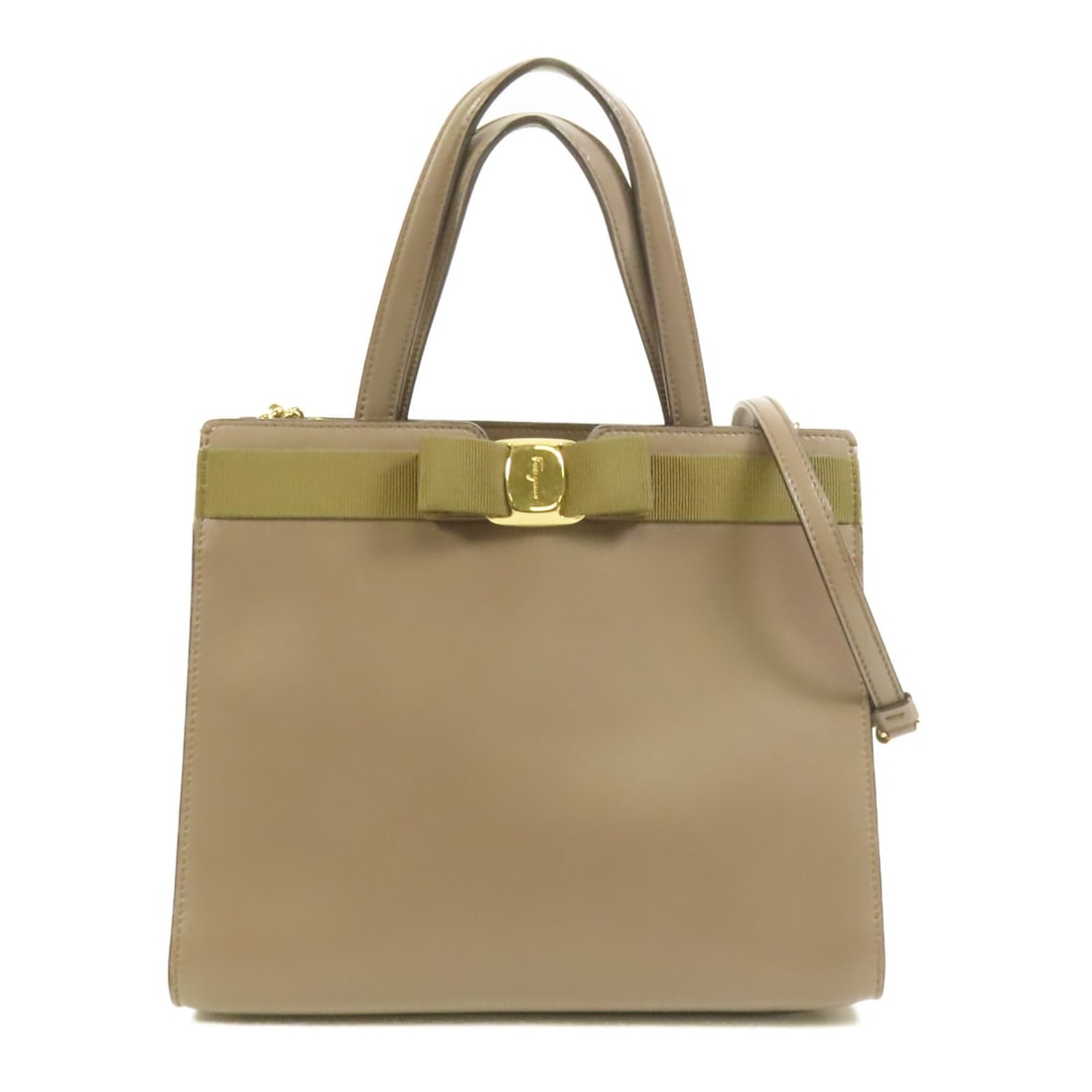 Grey Calfskin Vara Bow Top Handle Shoulder Bag by Salvatore Ferragamo: Grey Calfskin Vara Bow Top Handle Shoulder Bag by Salvatore Ferragamo This Salvatore Ferragamo Vara Bow Top Handle Bag is crafted from calfskin leather in a sophisticated gray color. Designed for vers