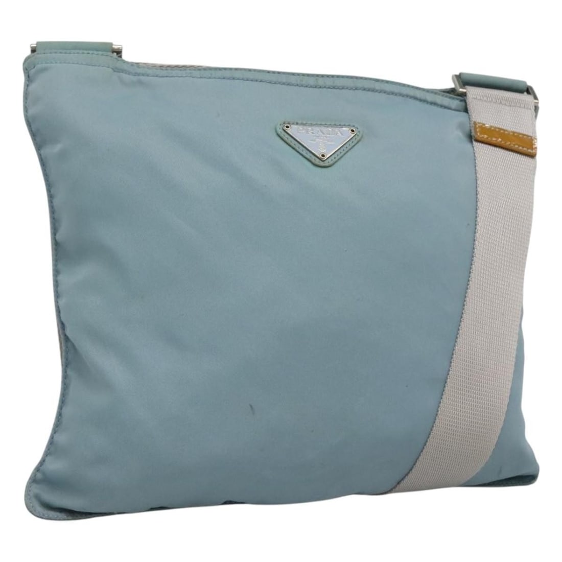 Prada Nylon Flat Messenger Bag in Blue for Women: Prada Nylon Flat Messenger Bag in Blue for Women Prada Flat Messenger Bag designed for women, crafted from blue nylon. This bag features a spacious design suitable for everyday use. It shows signs of