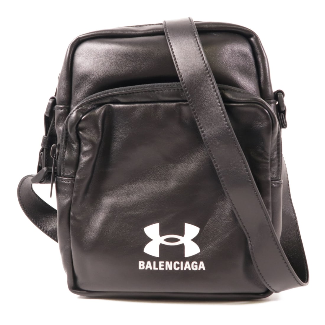 BALENCIAGA Black Leather Shoulder Bag Modern Design: BALENCIAGA Black Leather Shoulder Bag Modern Design This exquisite BALENCIAGA shoulder bag is crafted from high-quality leather in a sleek black hue, making it a versatile addition to any wardrobe. De