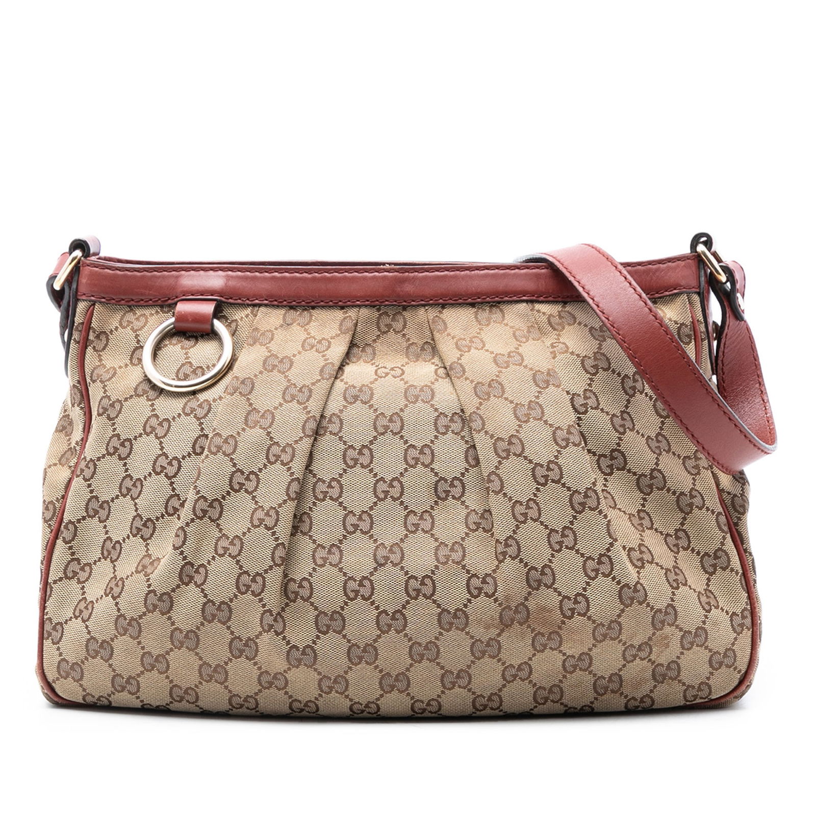 Gucci Sukey Brown GG Canvas Crossbody Bag with Leather Trim: Gucci Sukey Brown GG Canvas Crossbody Bag with Leather Trim This Gucci GG Canvas Sukey Crossbody features a canvas body with leather trim, a flat leather shoulder strap, a top zip closure, and interio