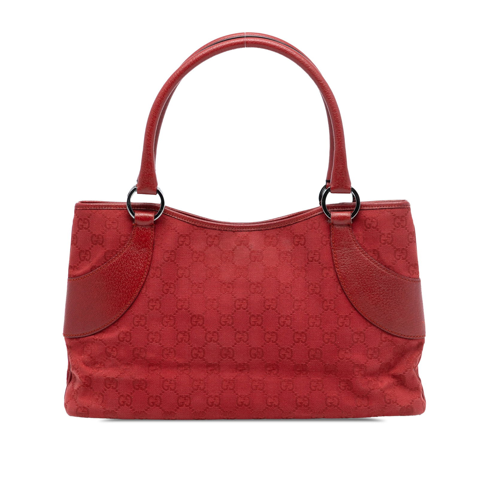 Red GG Canvas Tote Bag with Leather Trim by Gucci: Red GG Canvas Tote Bag with Leather Trim by Gucci This Gucci GG Canvas Tote features a canvas body with leather trim, rolled leather handles, an open top secured by a magnetic snap closure, and an int