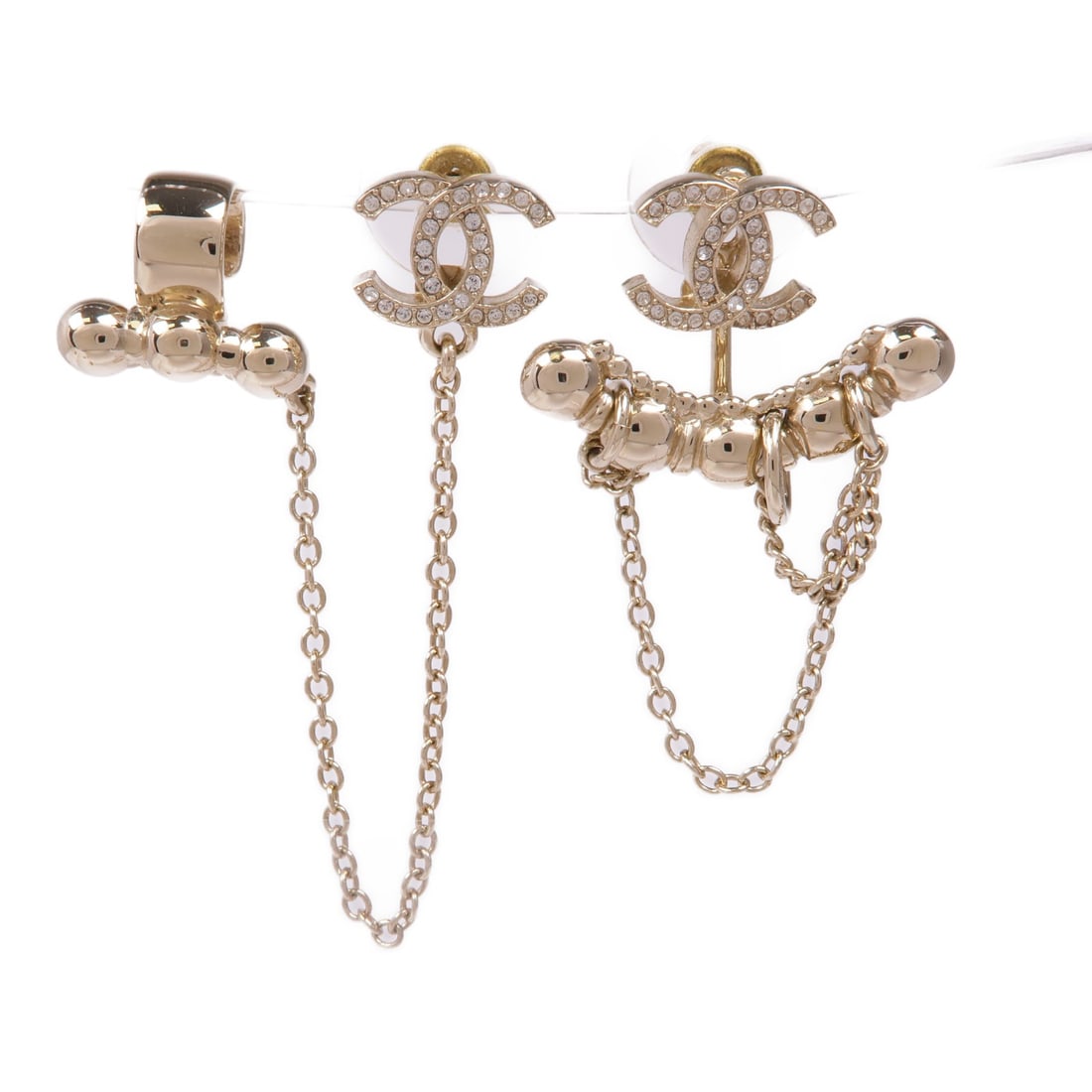 CHANEL Gold CC Logo Pierced Earrings Accessories: CHANEL Gold CC Logo Pierced Earrings Accessories Elevate your accessory collection with these stunning CHANEL CC Earrings. Expertly crafted in France, these pierced earrings feature a luxurious gold t