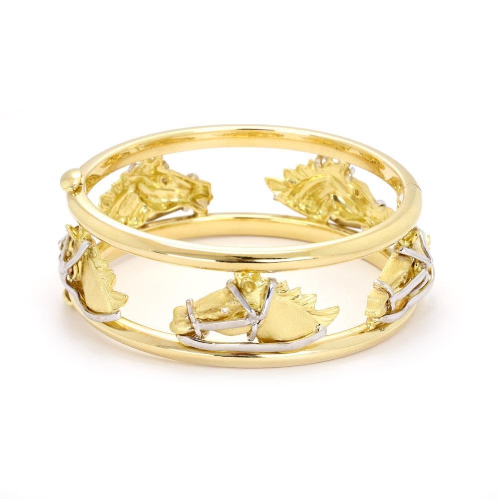 Roberto Coin Horse Bracelet 18k Two Tone Gold with Diamonds: Roberto Coin Horse Bracelet 18k Two Tone Gold with Diamonds Discover the exquisite craftsmanship of this authentic Roberto Coin Horse Bracelet, featuring a stunning open design that elegantly combines