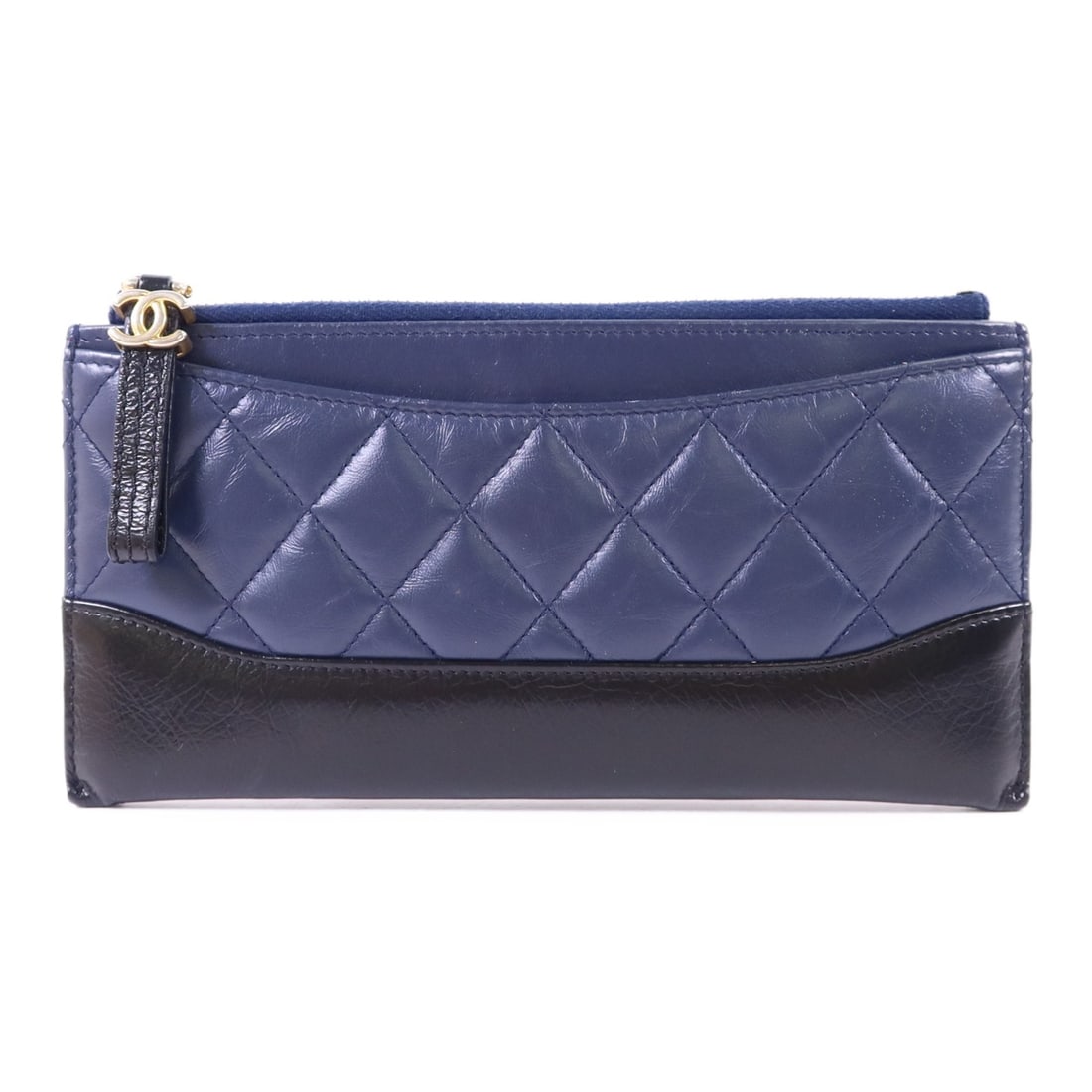 Gabrielle Navy Calfskin Long Wallet by Chanel with CC Logo: Gabrielle Navy Calfskin Long Wallet by Chanel with CC Logo This CHANEL CC Gabrielle long wallet is crafted from navy blue calfskin leather with a black accent, offering a sophisticated and timeless lo