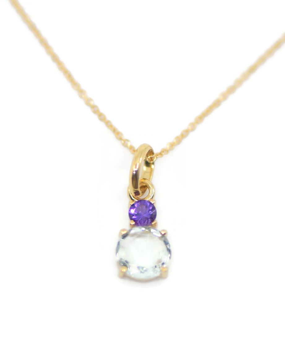 Tous 18K Yellow Gold Amethyst Pendant Necklace with Box: Tous 18K Yellow Gold Amethyst Pendant Necklace with Box This exquisite Tous Amethyst Pendant Necklace showcases a stunning design crafted from 18K yellow gold. The pendant features a vibrant amethyst