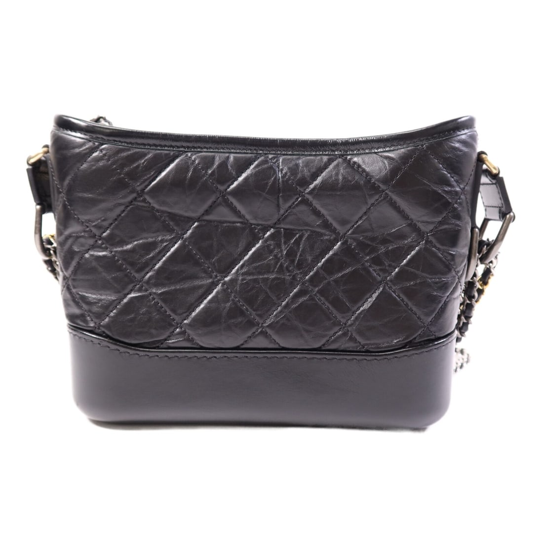 Small Black Calfskin Gabrielle Shoulder Bag by CHANEL: Small Black Calfskin Gabrielle Shoulder Bag by CHANEL This CHANEL Gabrielle Small Shoulder Bag is crafted from luxurious black calfskin leather, offering a sophisticated and timeless design. Made in F