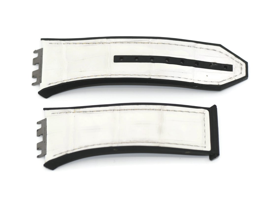 Authentic Hublot White Leather Watch Strap 31x23mm: Authentic Hublot White Leather Watch Strap 31x23mm This genuine Hublot white leather strap is designed for wristwatches, featuring a width of 31mm at the lug end and tapering to 23mm. The strap measur