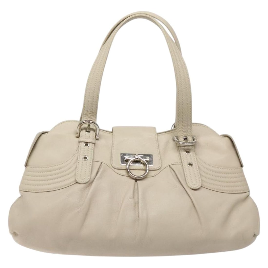 Gancini Leather Tote by Salvatore Ferragamo in White: Gancini Leather Tote by Salvatore Ferragamo in White This Salvatore Ferragamo Gancini handbag is crafted from white leather and features a spacious design. Made in Italy, it is designed for women and