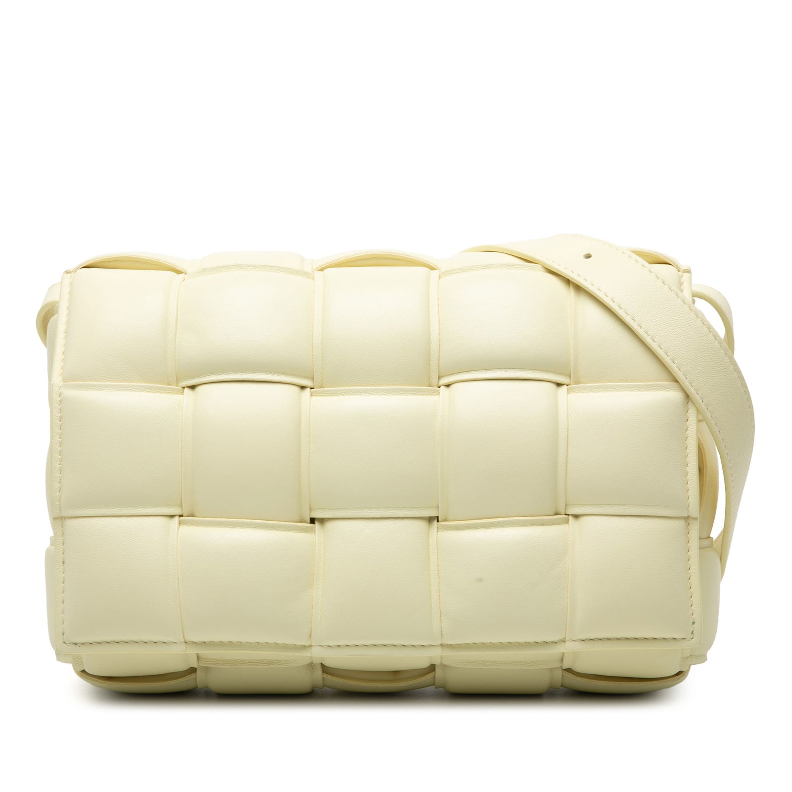 Yellow Nappa Leather Padded Cassette Crossbody Bag by Bottega Veneta: Yellow Nappa Leather Padded Cassette Crossbody Bag by Bottega Veneta This Bottega Veneta Padded Cassette crossbody bag features the signature Intrecciato woven nappa leather in a vibrant yellow. It is