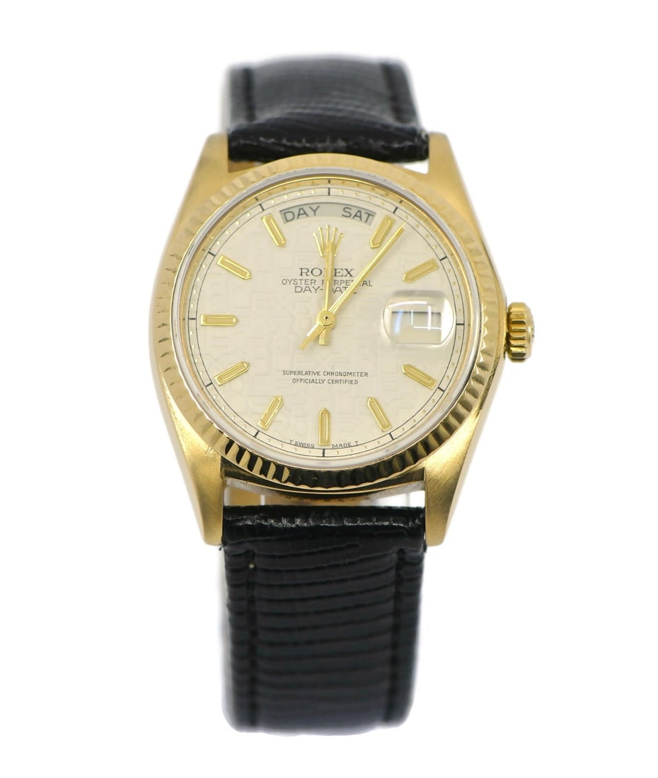 Rolex Day-Date 18K Yellow Gold Watch Model 18038 with Box: Rolex Day-Date 18K Yellow Gold Watch Model 18038 with Box This exquisite Rolex Day Date wristwatch showcases a luxurious 18K yellow gold case and a classic white dial, embodying elegance and sophistic
