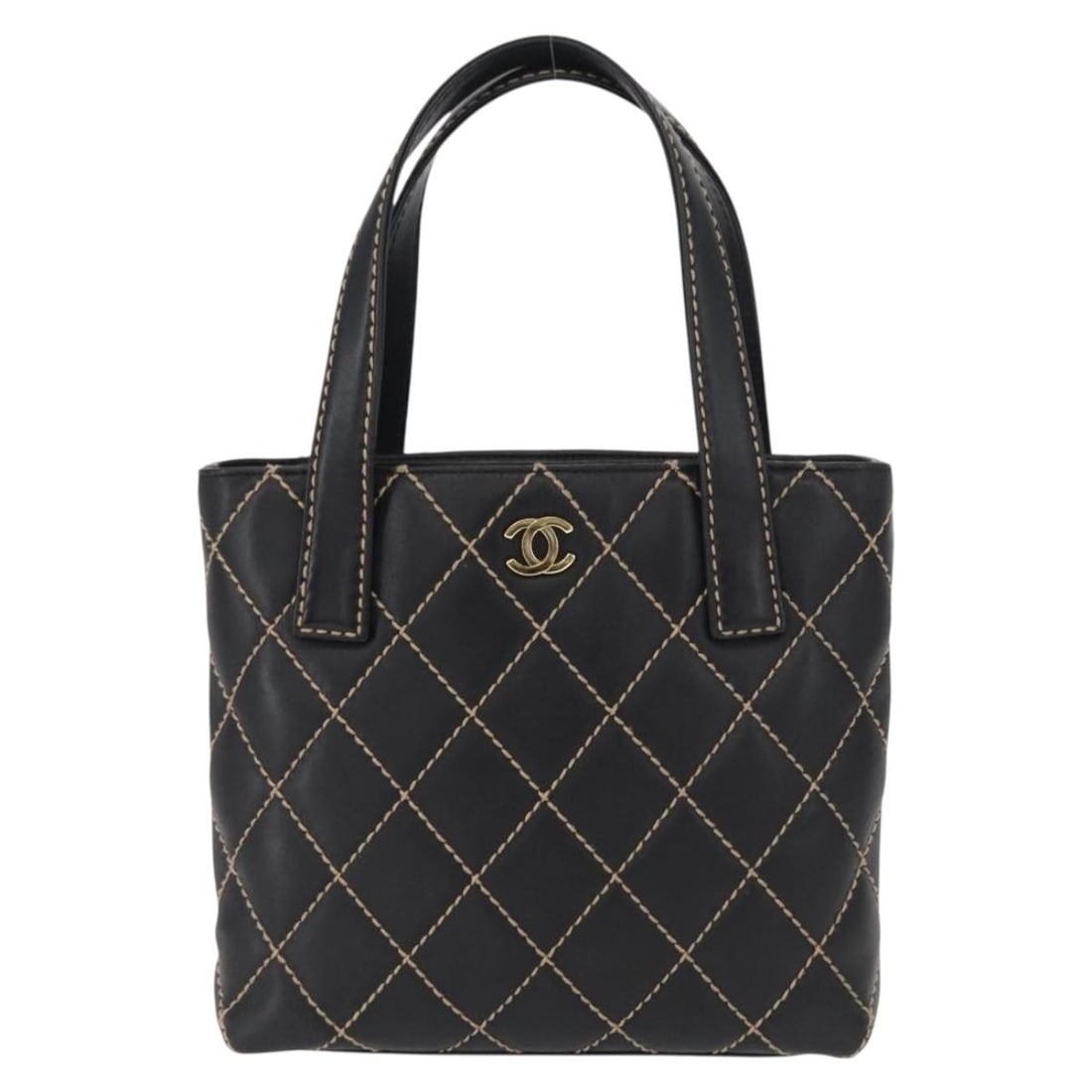Black Leather Surpique Tote by Chanel 24cm x 23cm x 7cm: Black Leather Surpique Tote by Chanel 24cm x 23cm x 7cm This Chanel Surpique Tote is crafted from black leather and designed for female use. It features a quilted pattern and a spacious interior with