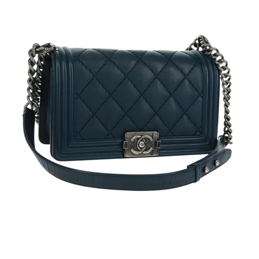 Navy Quilted Lambskin Chanel Boy Flap Leather Bag 25cm: Navy Quilted Lambskin Chanel Boy Flap Leather Bag 25cm Chanel Boy Flap Bag crafted from quilted navy lambskin leather, designed for women. The bag features a compact silhouette with minimal wear, incl