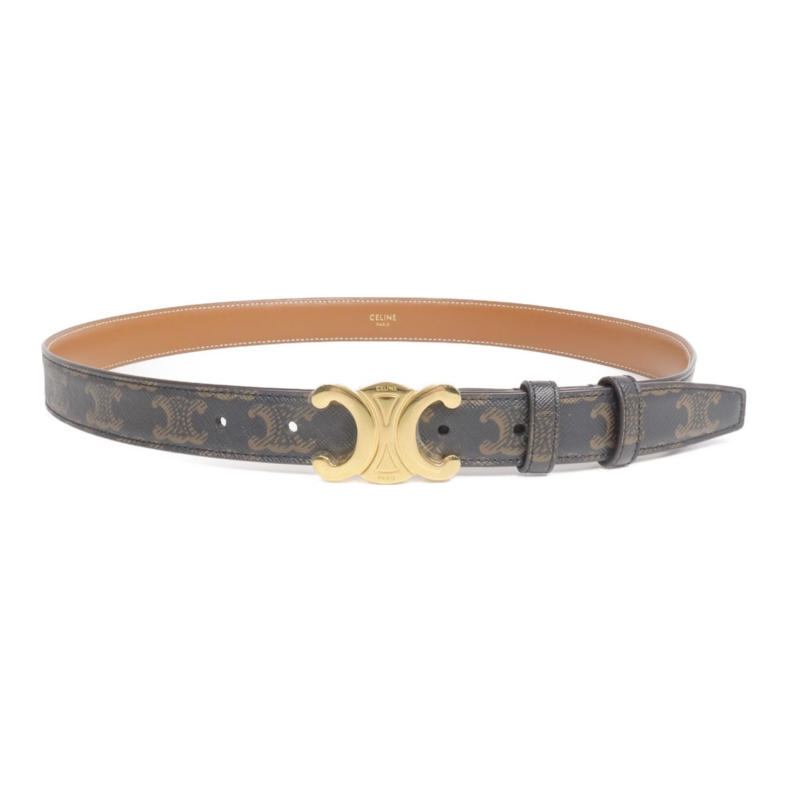 Brown PVC Coated Canvas Belt with Gold Hardware by CELINE: Brown PVC Coated Canvas Belt with Gold Hardware by CELINE This CELINE belt features a brown PVC coated canvas construction with gold-tone hardware. Designed in a regular size, it offers a stylish and
