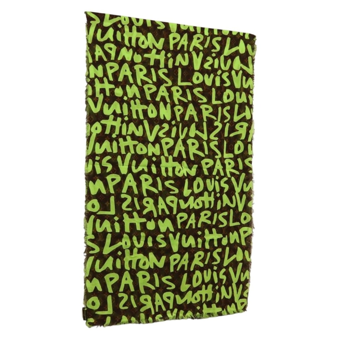 Green Monogram Graffiti Scarf by Louis Vuitton with Box: Green Monogram Graffiti Scarf by Louis Vuitton with Box This Louis Vuitton Monogram Graffiti Scarf features a vibrant green color and is crafted from Monogram Graffiti canvas. The scarf is made in Ita