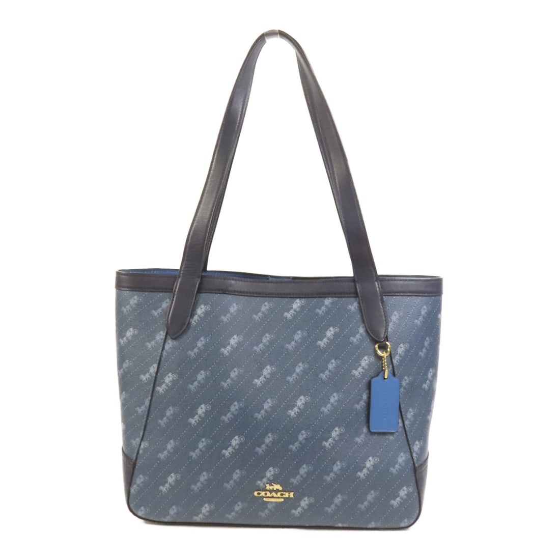 Blue COACH PVC Coated Canvas Shoulder Bag: Blue COACH PVC Coated Canvas Shoulder Bag This COACH shoulder bag features a blue PVC coated canvas exterior, offering both durability and style. Designed in a regular size, this bag provides ample sp