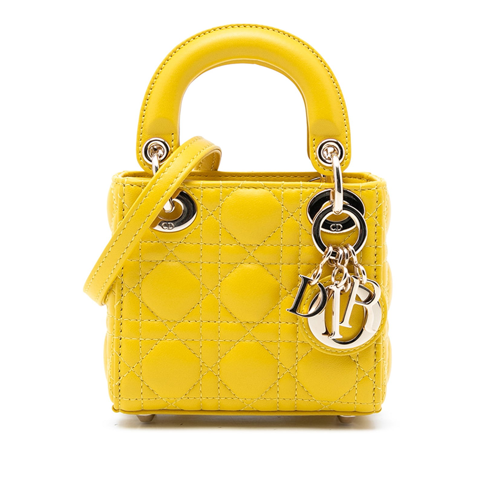 Dior Lady Dior Micro Bag Yellow Quilted Lambskin Cannage Pattern: Dior Lady Dior Micro Bag Yellow Quilted Lambskin Cannage Pattern This Micro Lady Dior bag showcases a quilted lambskin leather exterior in a vibrant yellow hue, featuring flat leather top handles and