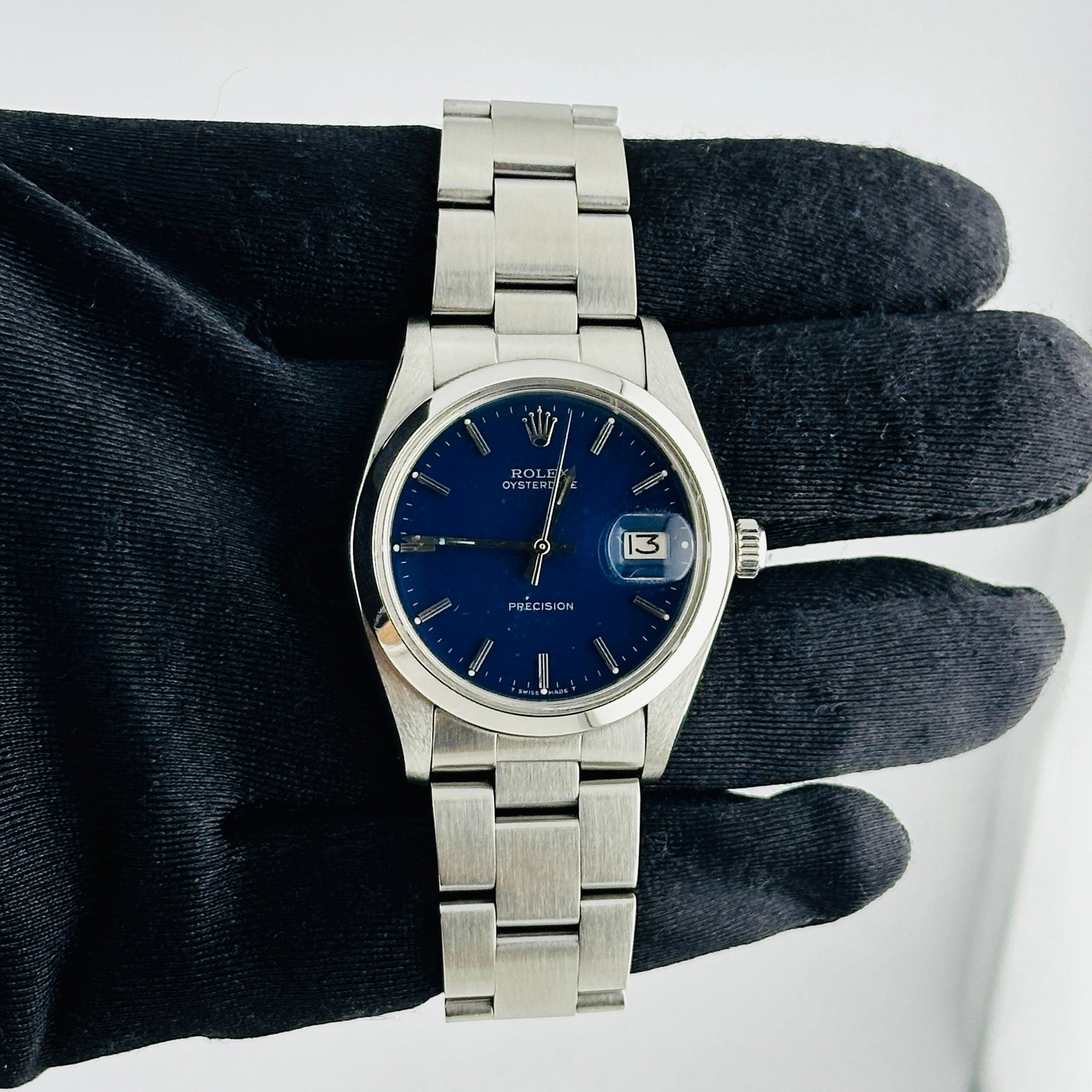 Oysterdate Precision 6694 Watch With Aftermarket Blue Dial and Oyster Bracelet: Oysterdate Precision 6694 Watch With Aftermarket Blue Dial and Oyster Bracelet This Rolex Oysterdate Precision features a distinctive Aftermarket Blue dial and a smooth bezel, complemented by a classi