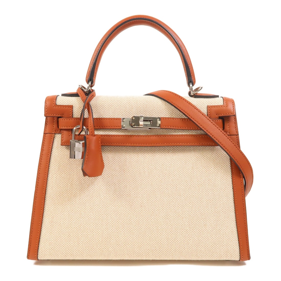 Hermes Kelly 25 Cuivre Swift Leather H Canvas PHW Two Way Shoulder Bag: Hermes Kelly 25 Cuivre Swift Leather H Canvas PHW Two Way Shoulder Bag This Hermes Kelly 25 is a versatile 2-way shoulder bag crafted from Swift leather and Toile H canvas in a brown Cuivre color. The