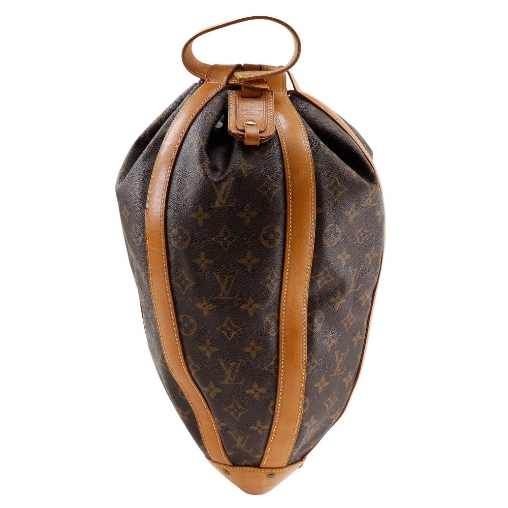 Romeo Gigli Unisex Louis Vuitton Brown Monogram Canvas Bag 24cm x 48cm x 16cm: Romeo Gigli Unisex Louis Vuitton Brown Monogram Canvas Bag 24cm x 48cm x 16cm Louis Vuitton Romeo Gigli handbag crafted from brown monogram canvas, designed for unisex use. It features a spacious inte
