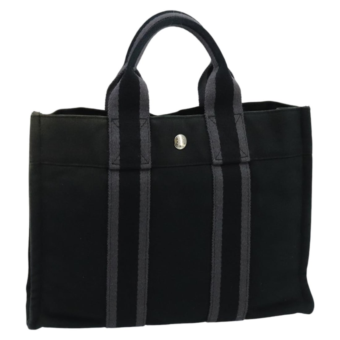 Hermes Fourre Tout Black Canvas Tote Bag 30cm: Hermes Fourre Tout Black Canvas Tote Bag 30cm The Hermes Fourre Tout Tote Canvas is a stylish and practical bag crafted from black canvas. Designed for women, this tote is pre-owned and remains in goo