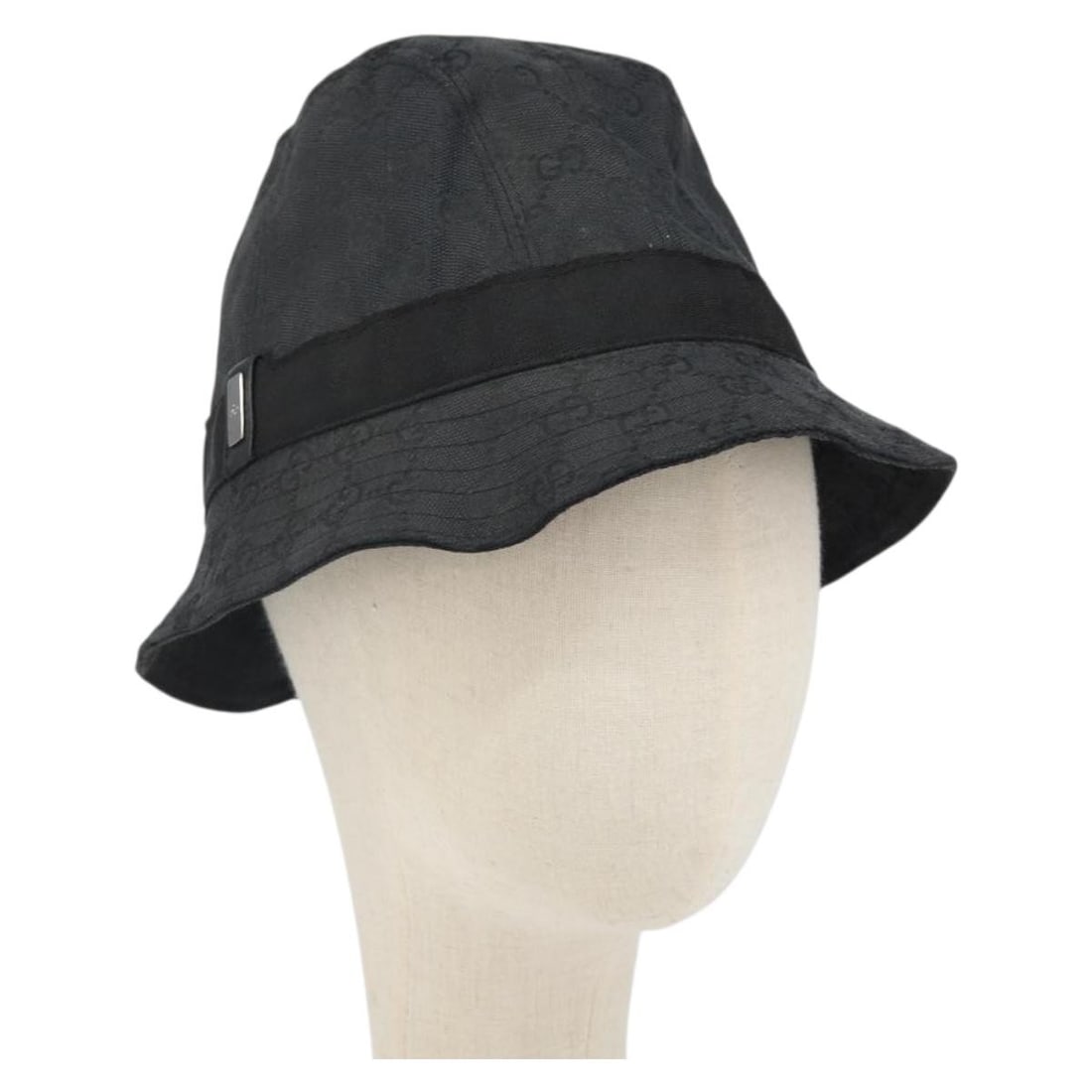 Black GG Canvas Bucket Hat by Gucci Made in Italy: Black GG Canvas Bucket Hat by Gucci Made in Italy This Gucci bucket hat is crafted from black GG canvas and made in Italy. It features a classic bucket hat style with slight surface rubbing and minor